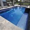 Glass mosaic tile Zafiro by Ezarri. Installed on swimming pool.
