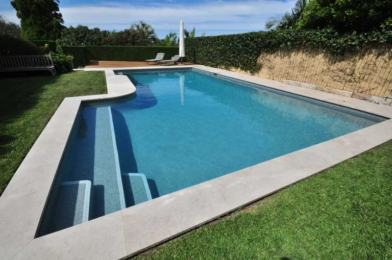 Backyard pool tiled in Smoke grey glass mosaic
