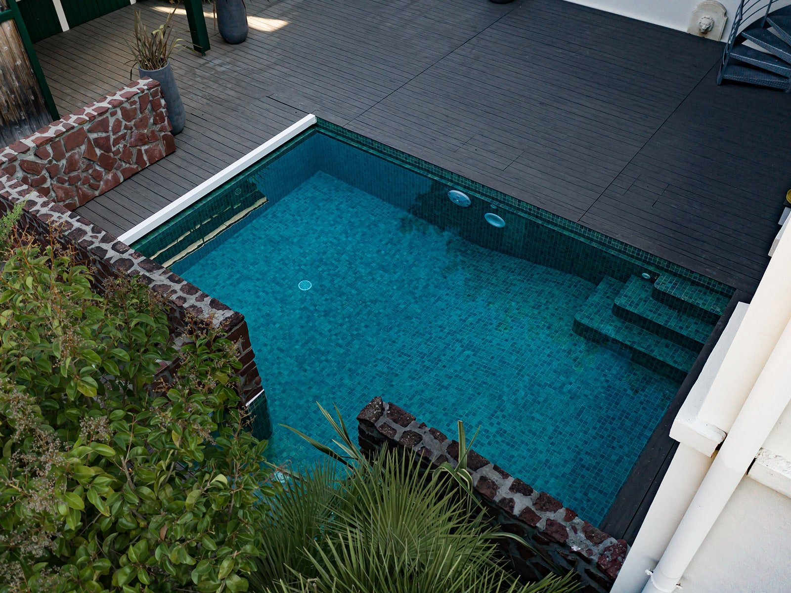 Swimming pool tiling